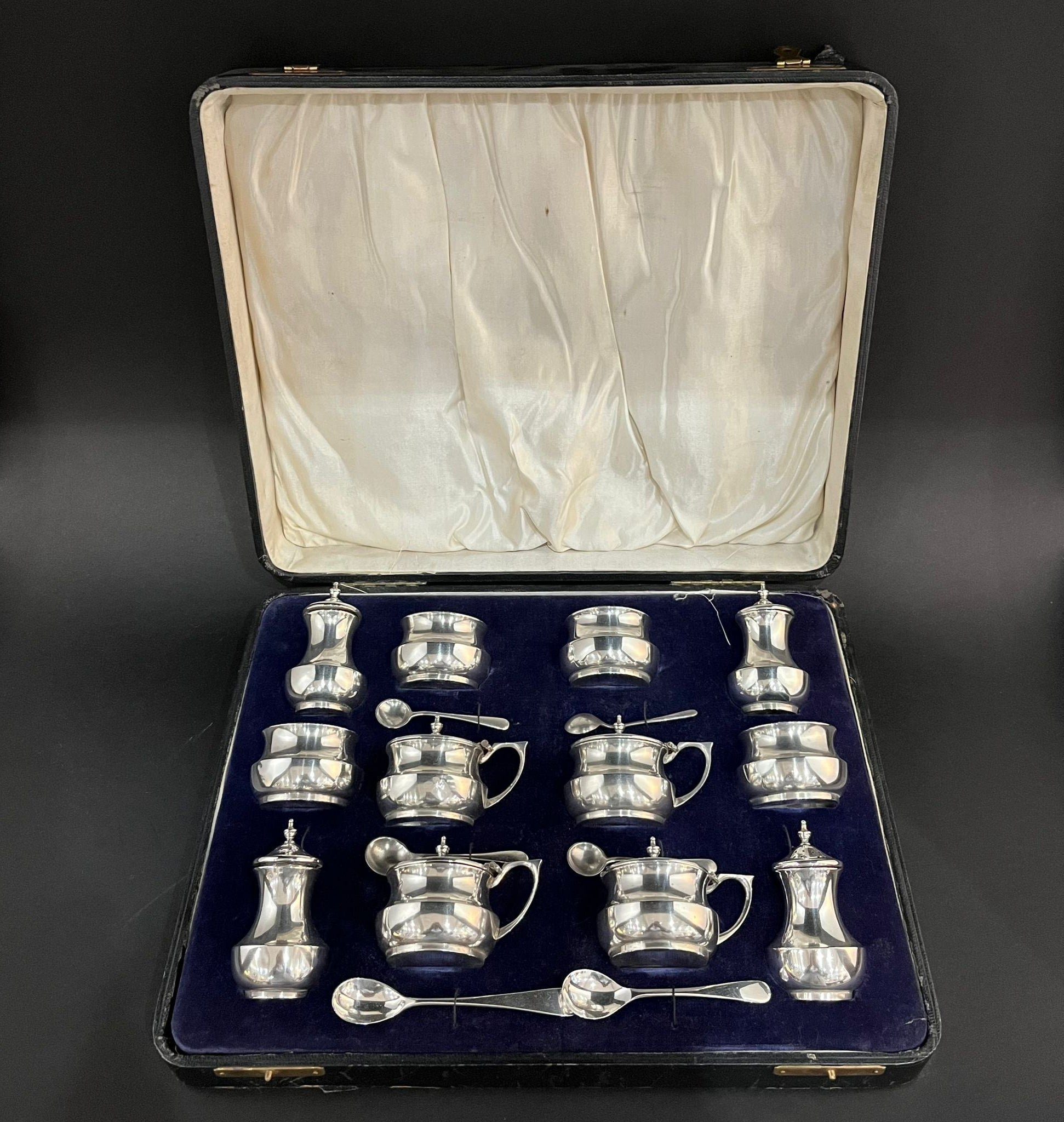 12 piece silver cruet set