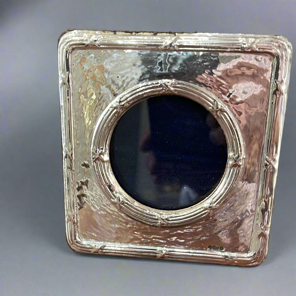 2.5" diameter  silver frame 