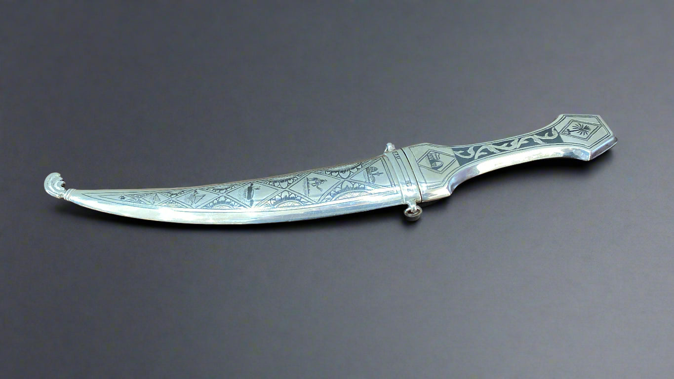 antique persian dagger with silver handle and sheath