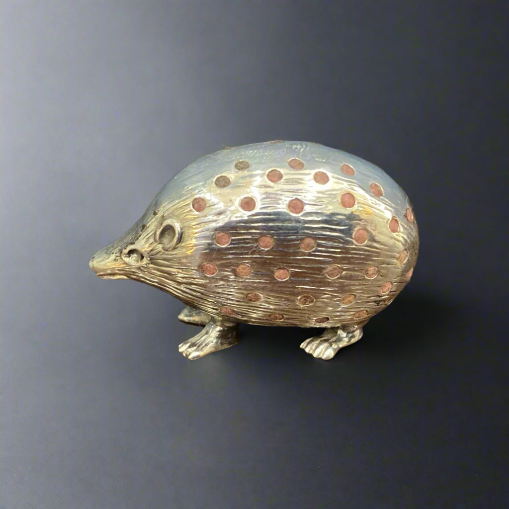 silver hedgehog pin cushion