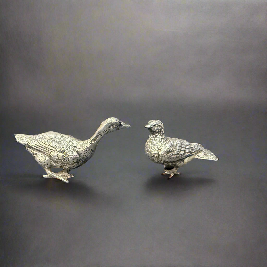 pair of silver geese