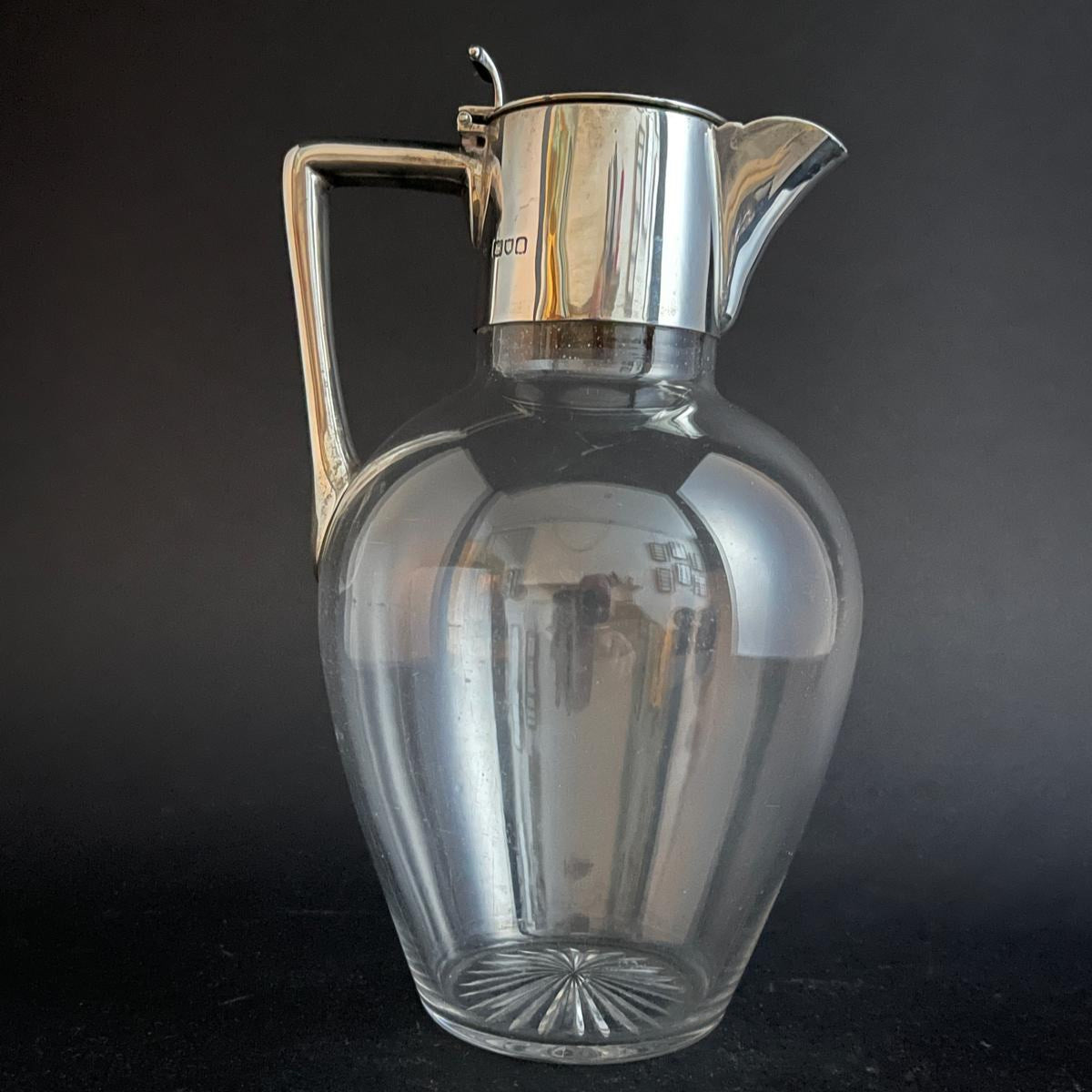 Cut glass and silver topped claret jug made in London 1900 by John Bodman Carrington