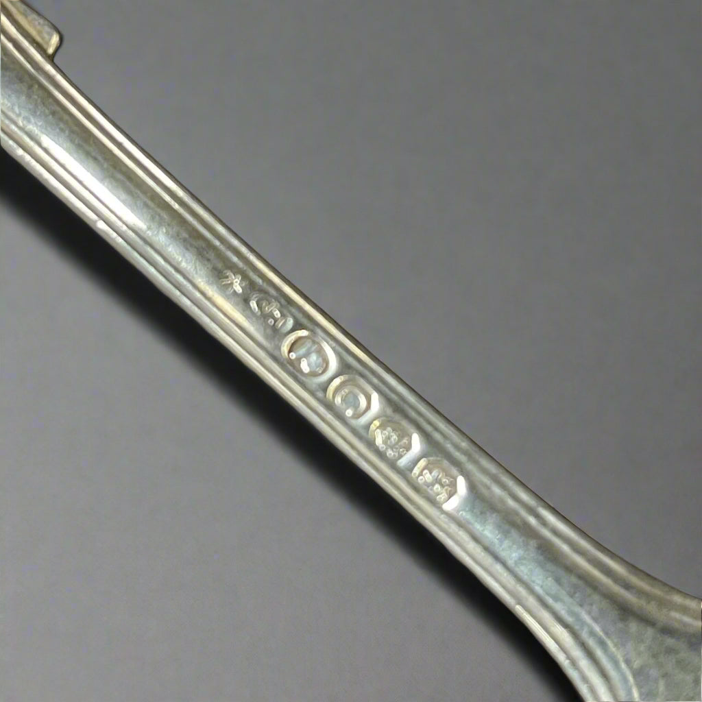 Silver fiddle, thread and shell dessert spoon made in London 1818 by Paul Storr