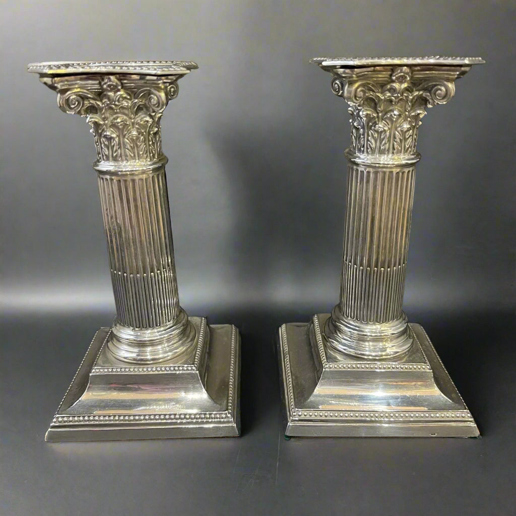 Pair of silver dwarf Corinthian column candlesticks mad ein Sheffield 1887 by Hawkswroth and Eyre