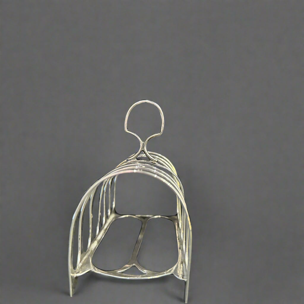 Silver toast rack made in Chester 1923 by William Hutton & Son