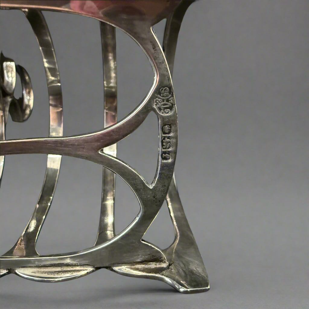 Silver toast rack made in Chester 1923 by William Hutton & Son