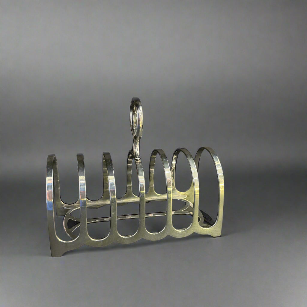 Silver toast rack made in Chester 1923 by William Hutton & Son