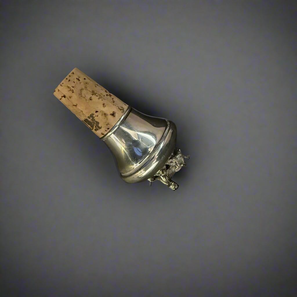 Silver topped bottle stopper decorated with a dog chasing a grouse made in Birmingham 1998