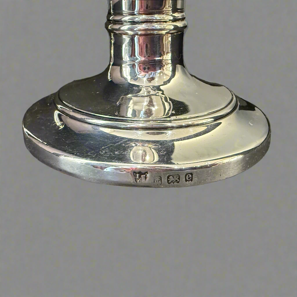 Pair of semi-dwarf silver candlesticks on round base made in Birmingham 1904 by IS Greenberg & Co