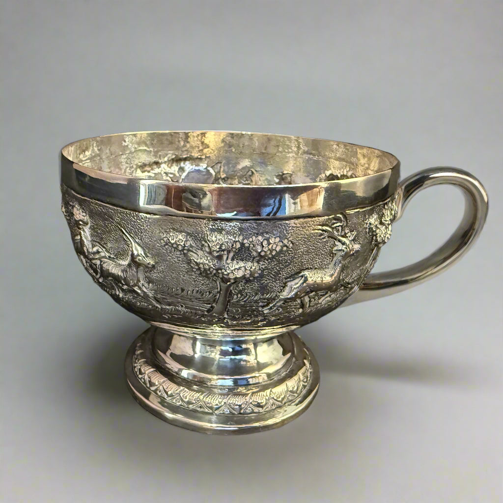 Raised Persian silver bowl with animal scene circa 1900 