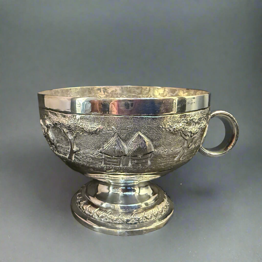 Raised Persian silver bowl with animal scene circa 1900 