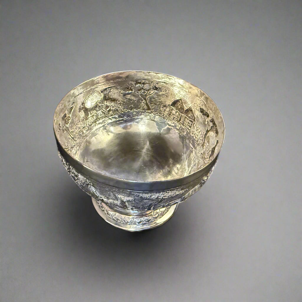 Raised Persian silver bowl with animal scene circa 1900 