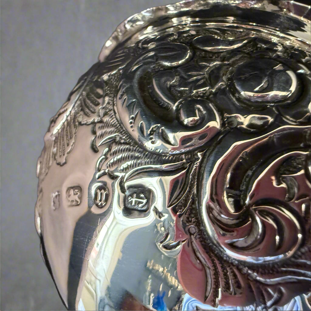 Heavily embossed silver bowl made in Birmingham 1894