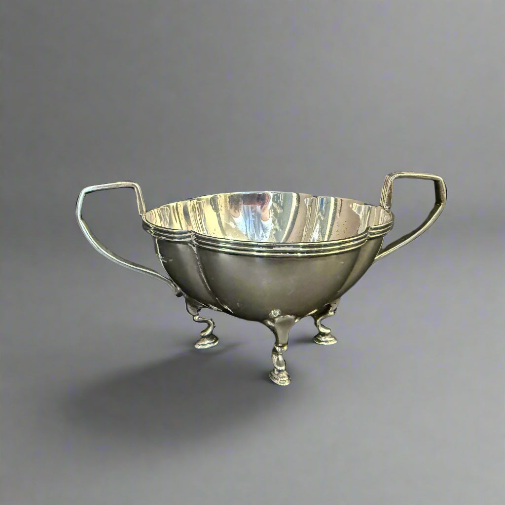 Two-handled petal shaped silver sugar basket made in Sheffield 1909 by Walker and Hall 