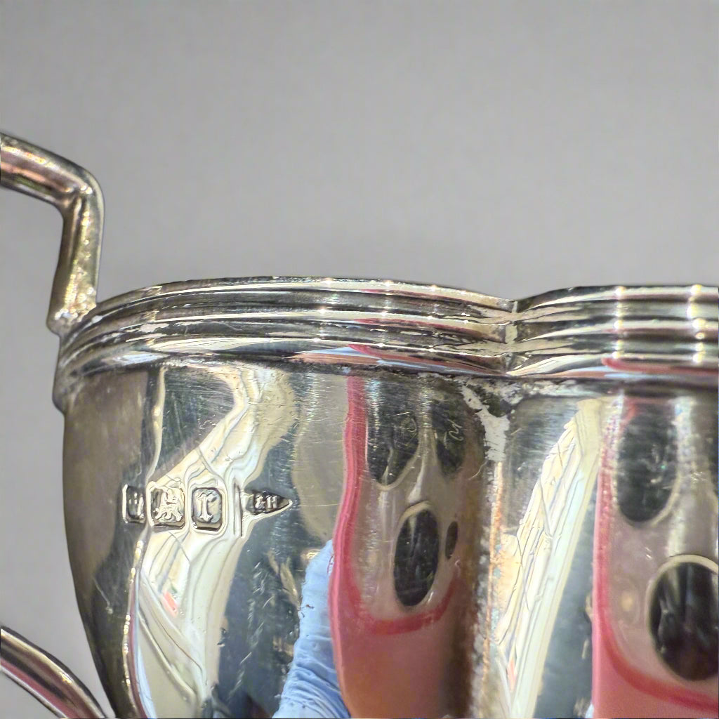 Two-handled petal shaped silver sugar basket made in Sheffield 1909 by Walker and Hall 