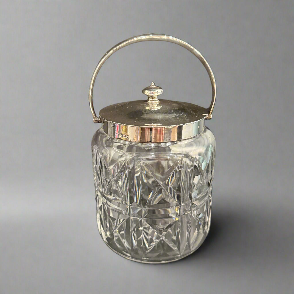 Cut glass and silver biscuit jar made in London 1908 by Charles & Richard Comyns 