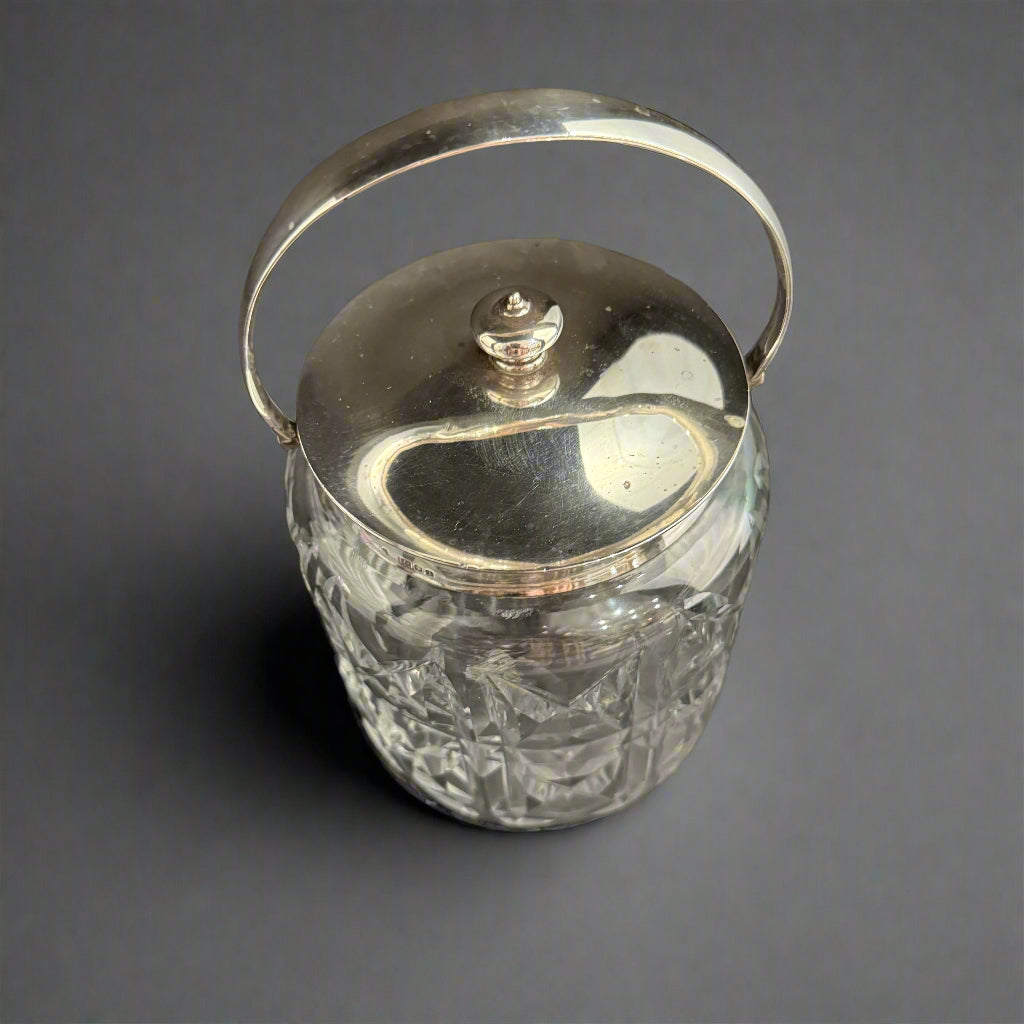 Cut glass and silver biscuit jar made in London 1908 by Charles & Richard Comyns 