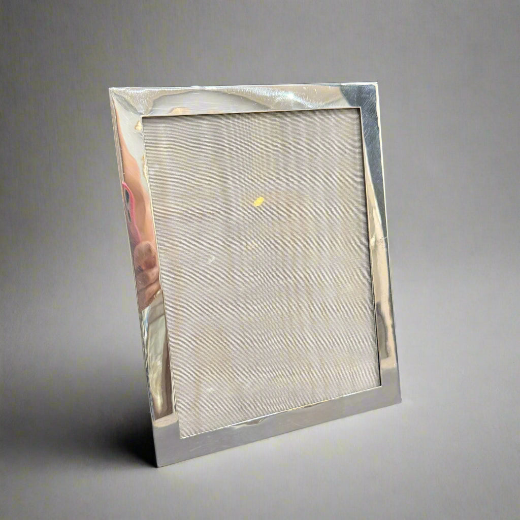 9x7" plain silver frame made in Birmingham 1920 by William Neal Ltd 