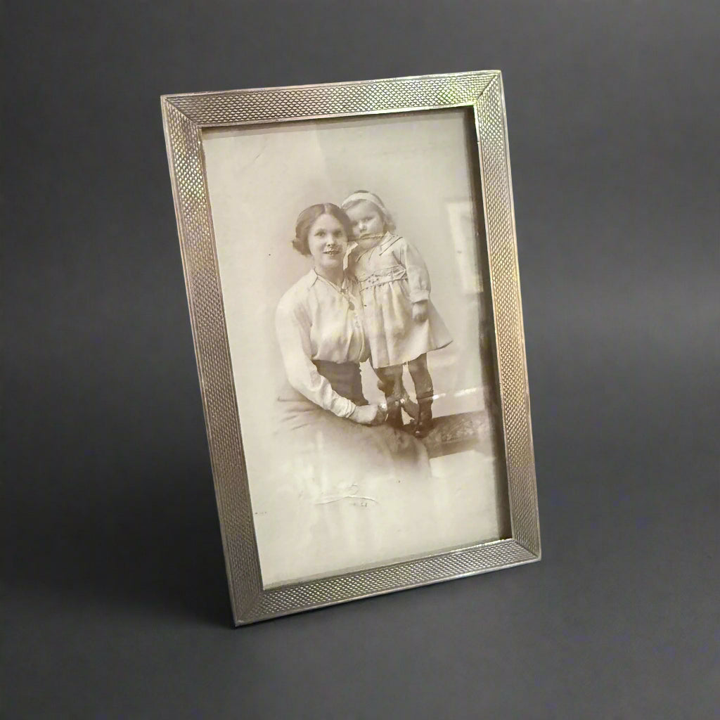 5x3" machine-turned silver frame made in Birmingham 1956