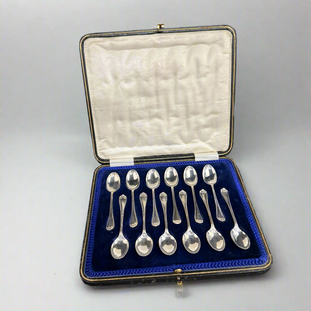 Boxed set of 12 silver teaspoons made in Sheffield 1920 by Cooper Brothers
