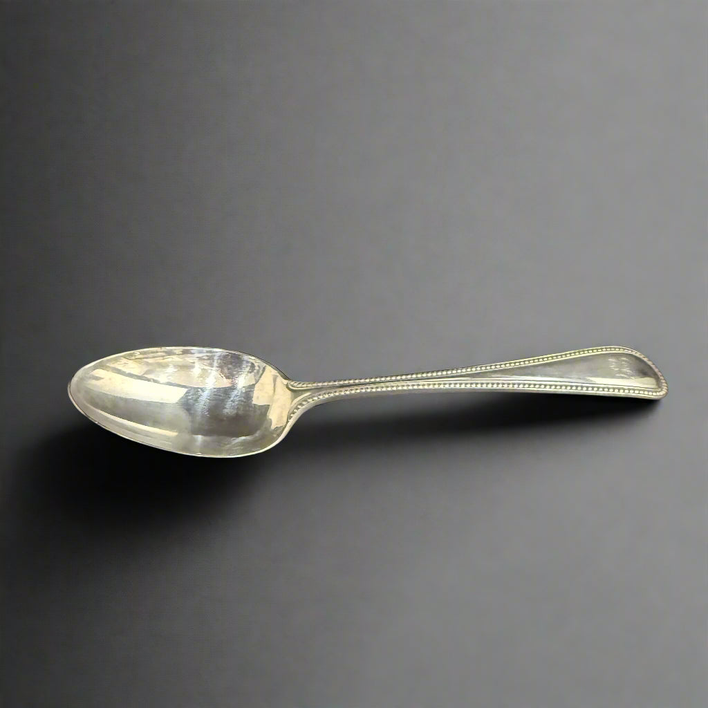 Silver bead pattern dessert spoon made in Sheffield 1926 by William Gilmore