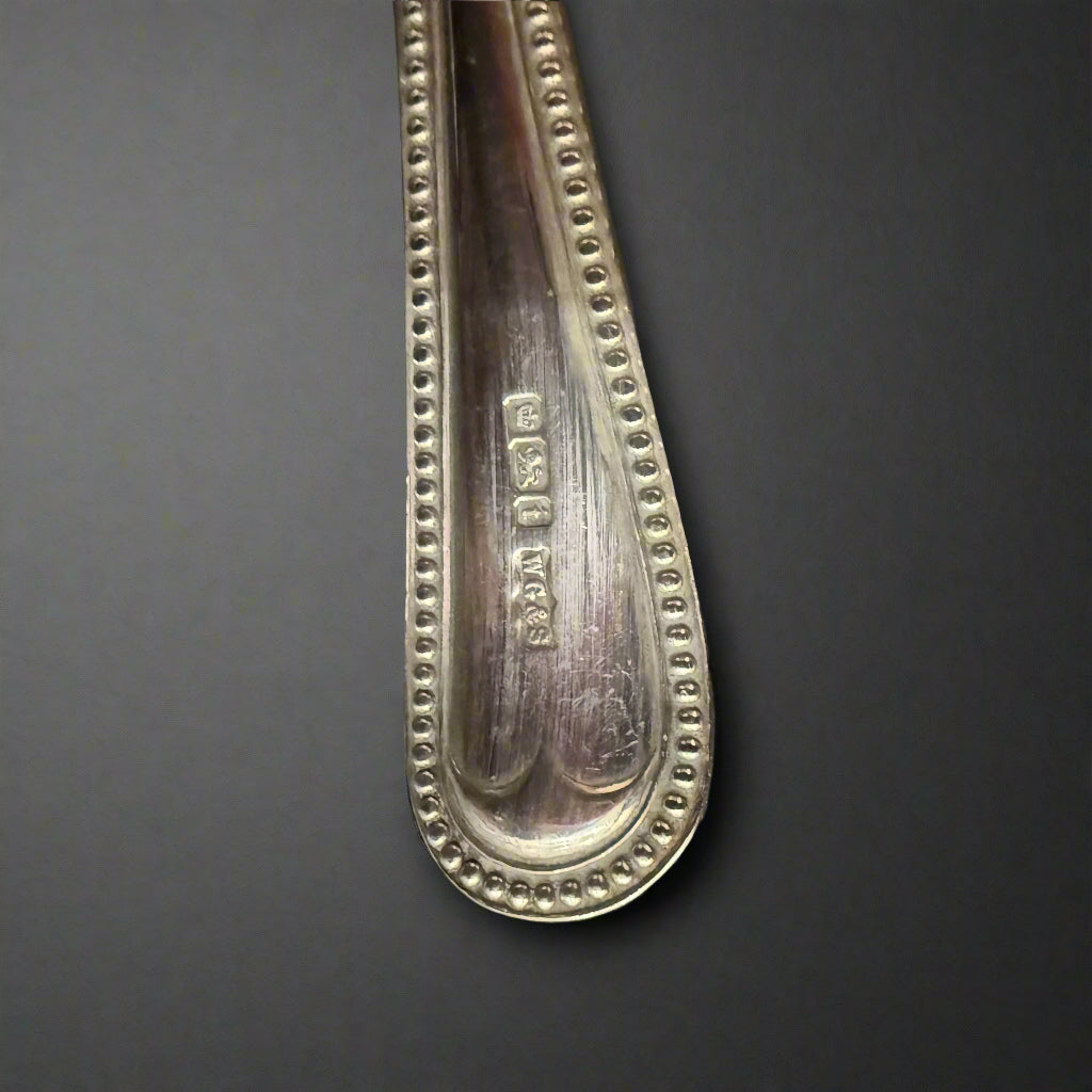 Silver bead pattern dessert spoon made in Sheffield 1926 by William Gilmore