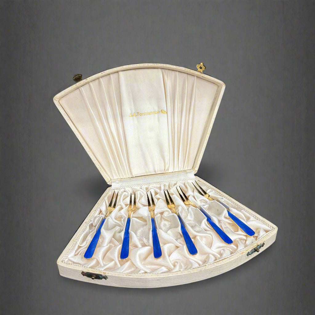 Silver gilt & blue enamel cocktail forks made in Finland circa 1920