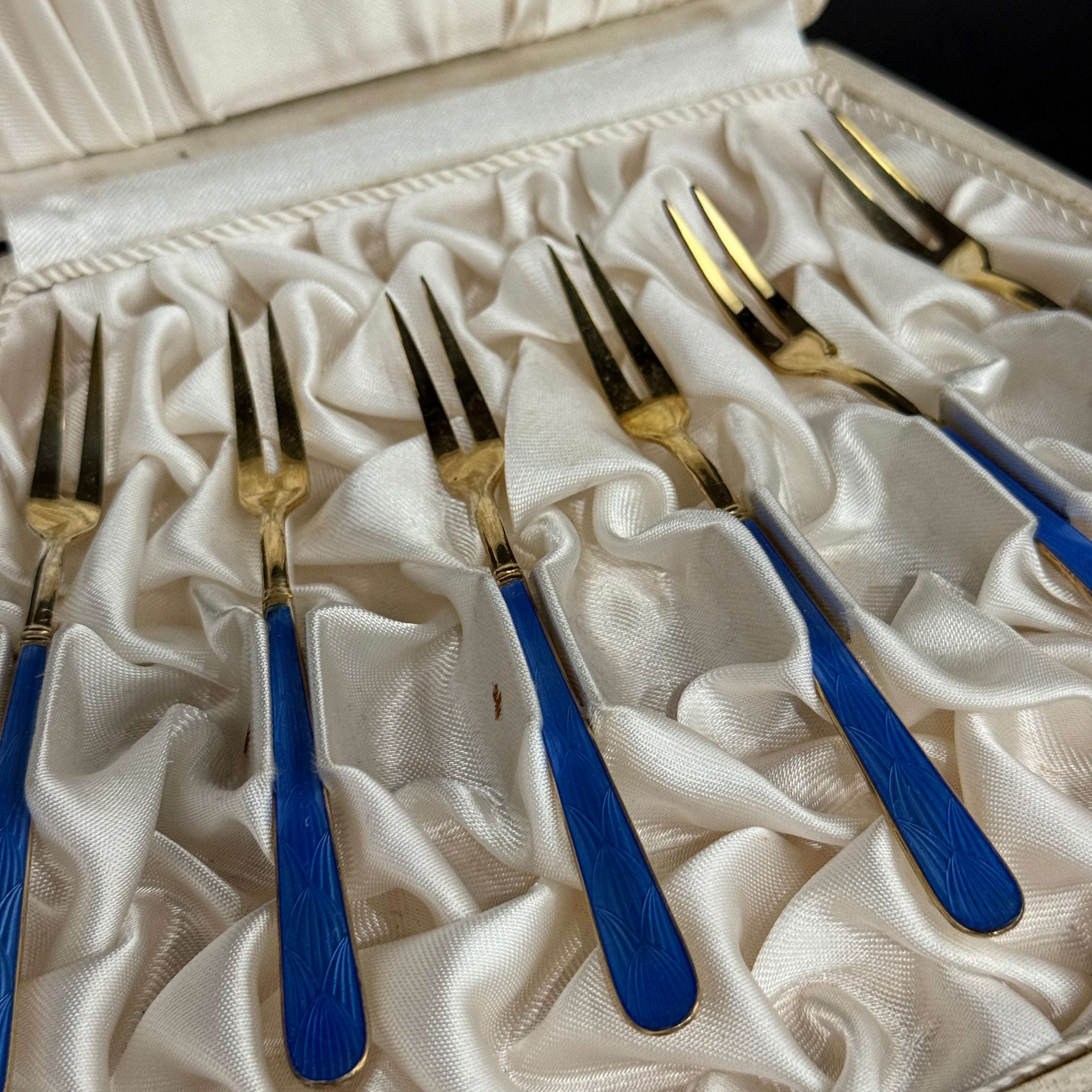 Silver gilt & blue enamel cocktail forks made in Finland circa 1920