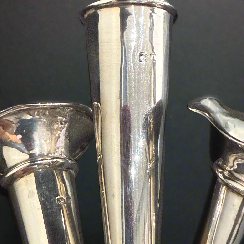 Triple trumpet shape bud vase made in Birmingham 1910 by William Hutton & Son
