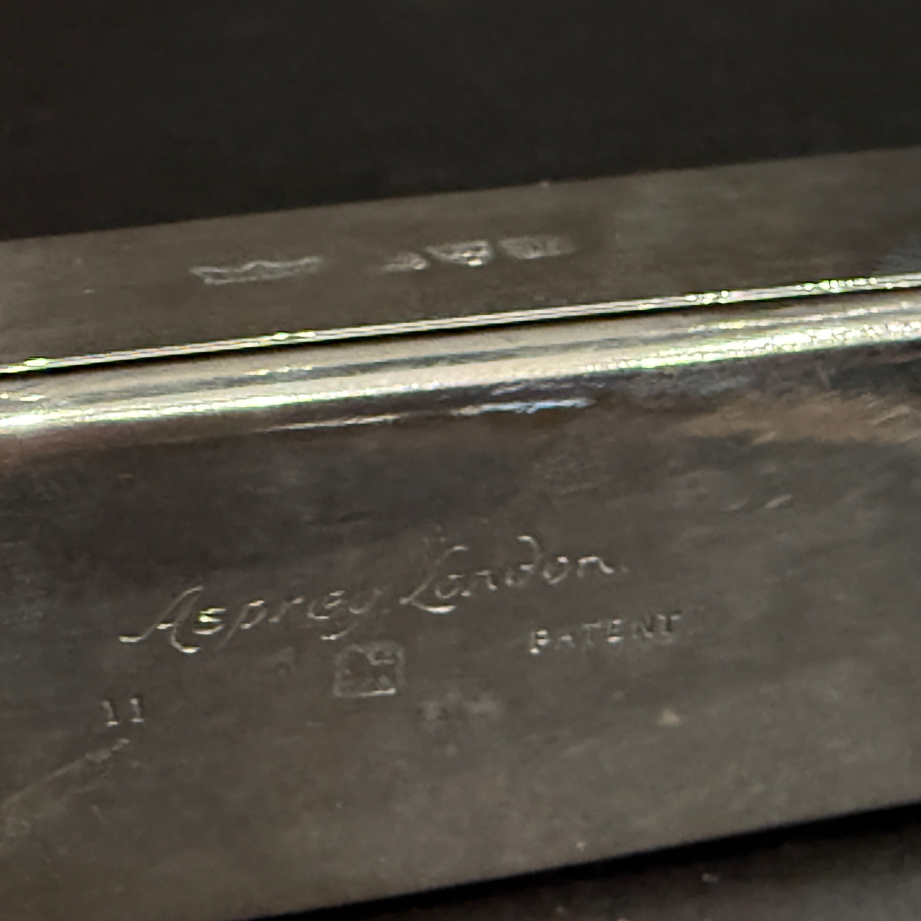 Silver sealing wax holder with griffin seal on base made in Chester 1908 by Sampson Mordan for Asprey of London