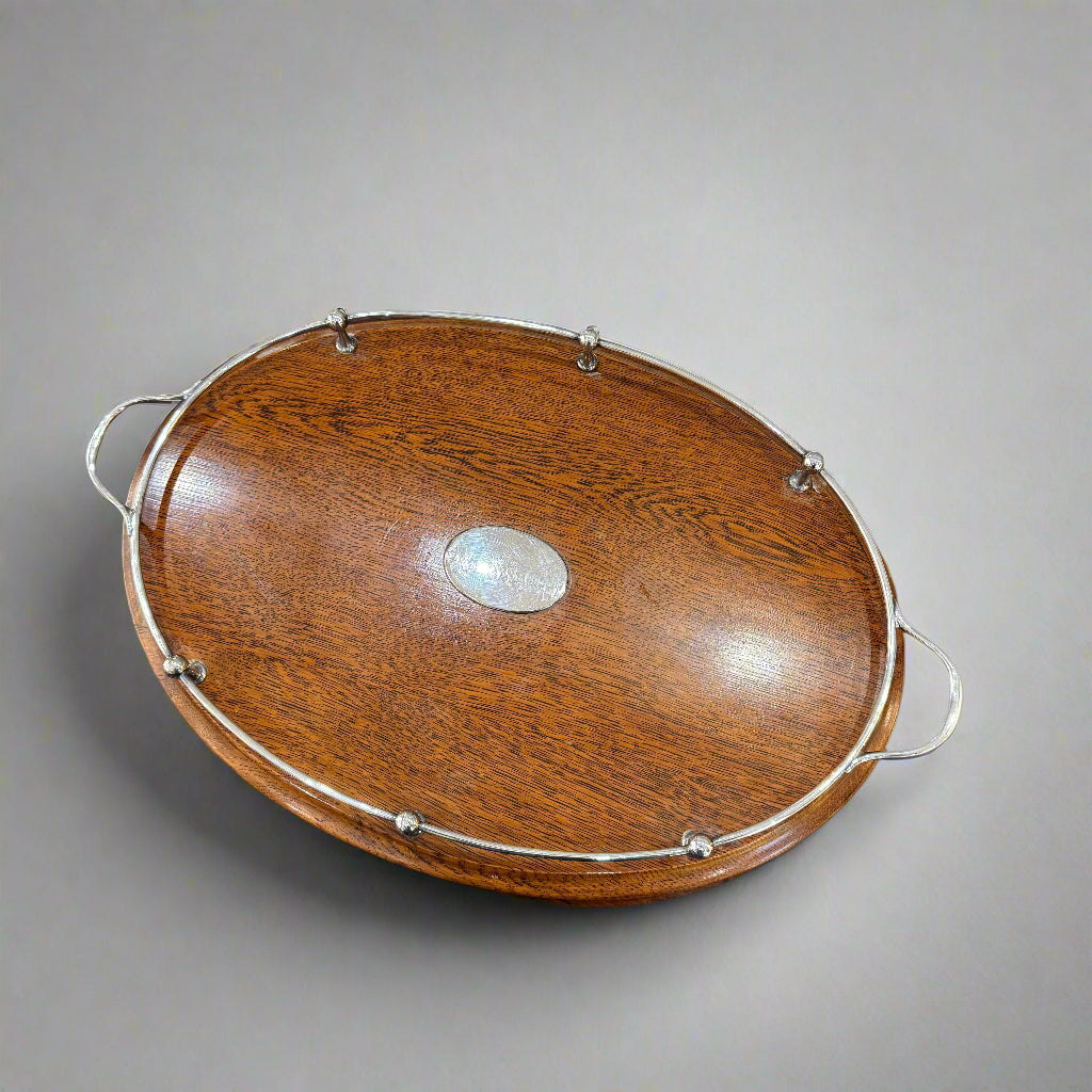 Oval oak tray with silver plate gallery & handle 