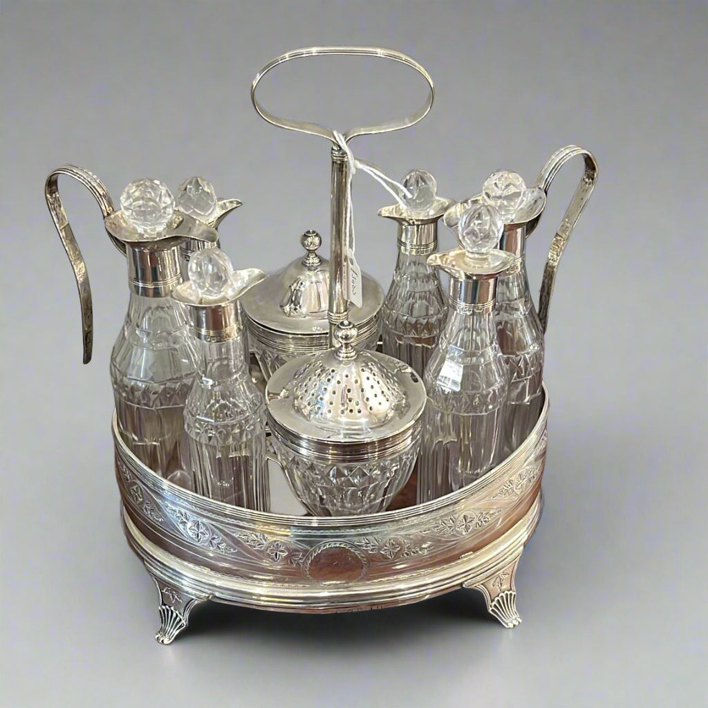 Georgian cruet set of 6 bottles and 2 jars on a silver bracket London 1799