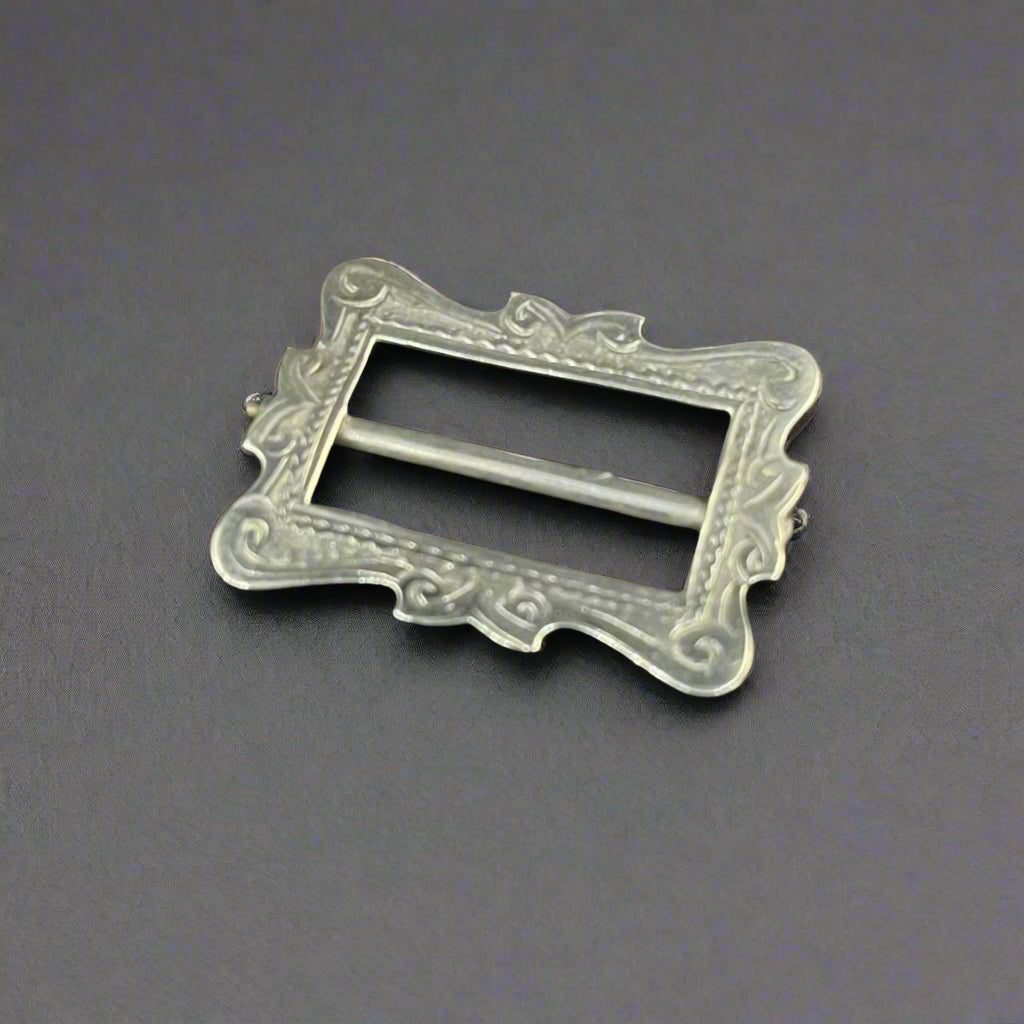 Antique silver belt buckle