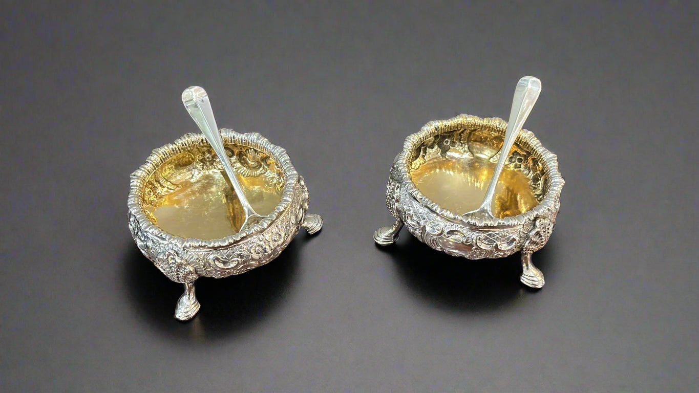 Pair of silver gilt salts with spoons