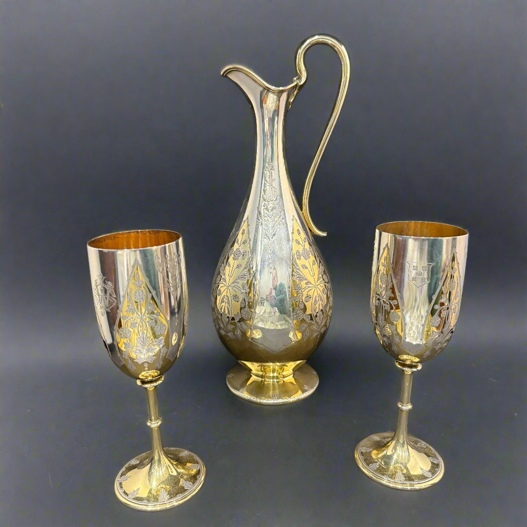 Elkington antique parcel gilt wine ewer and pair of goblets made in London 1875