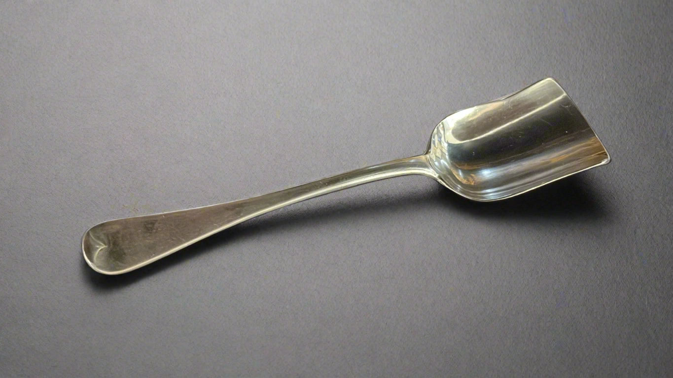 Silver sugar shovel made in Birmingham 1877