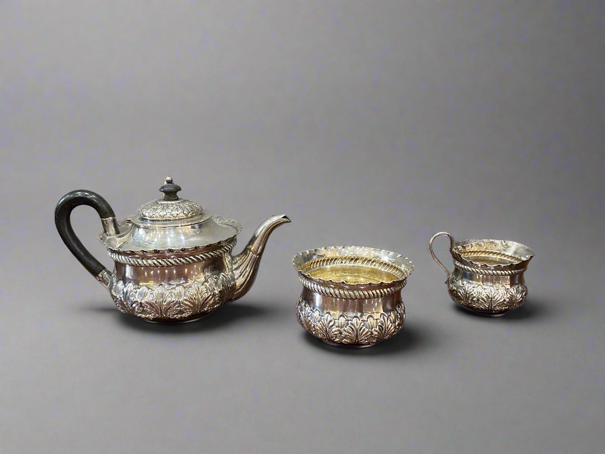 Three-piece bachelor silver tea London 1889 by Josiah Williams
