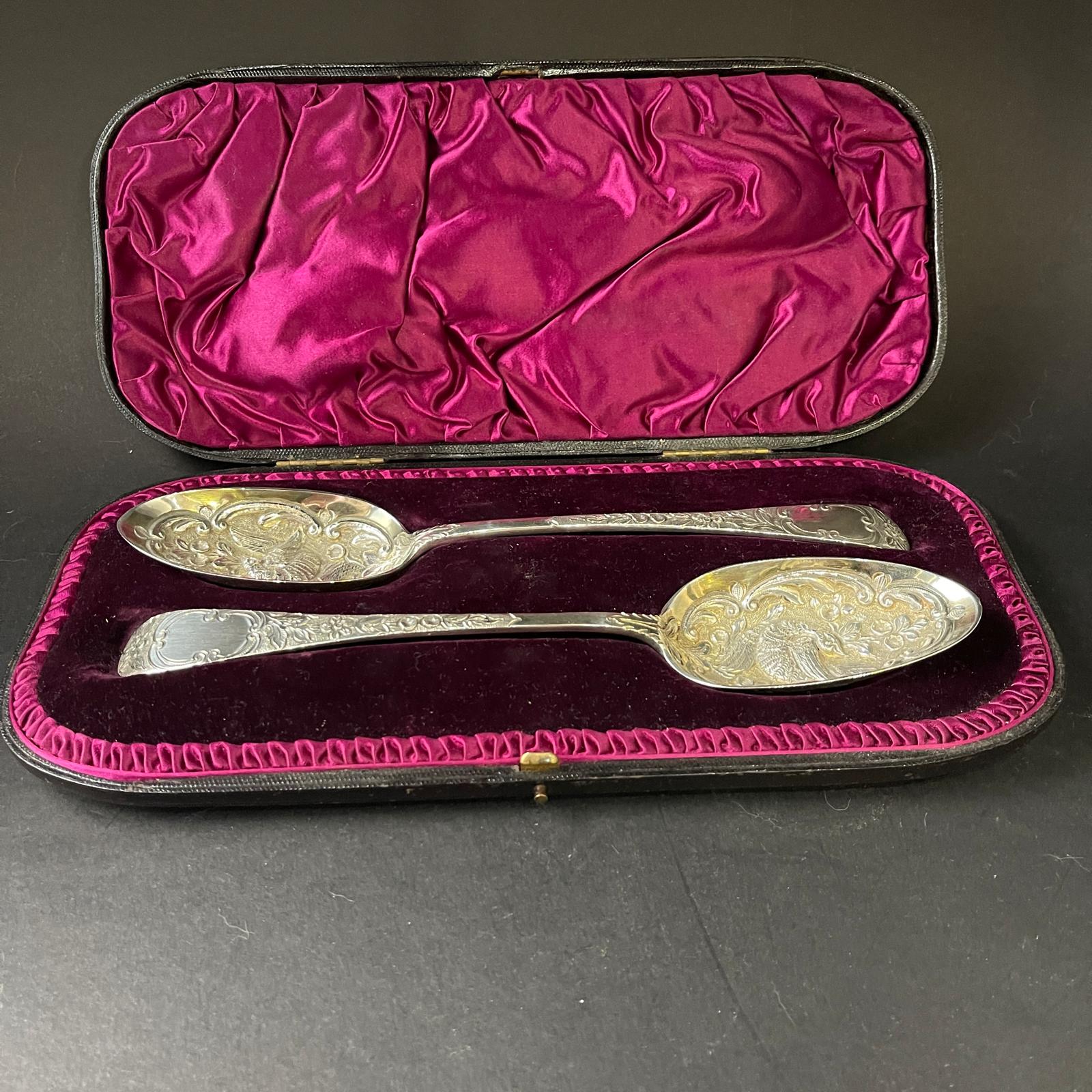 Boxed pair of heavily embossed silver berry spoons made in London 1803 by Thomas Wallis II 