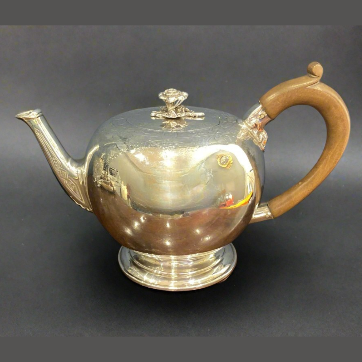 antique silver bullet teapot