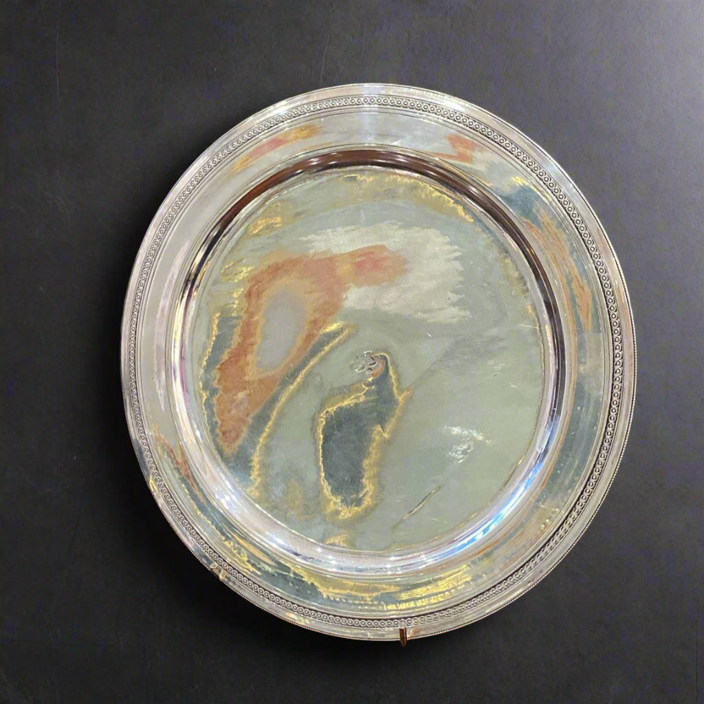 Silver serving plate with bead edge and chased inner rim made in Egypt circa 1940 by Beni Soeuf