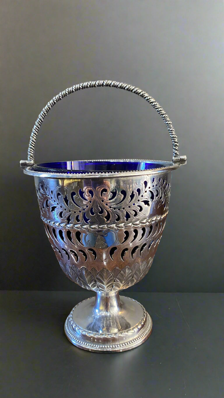 silver sugar bowl with blue glass liner