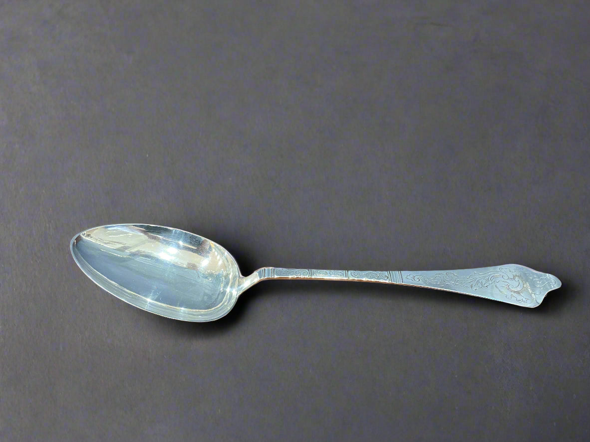 Oversized silver serving spoon with dog nose style handle with floral etching work made in Denmark 1946