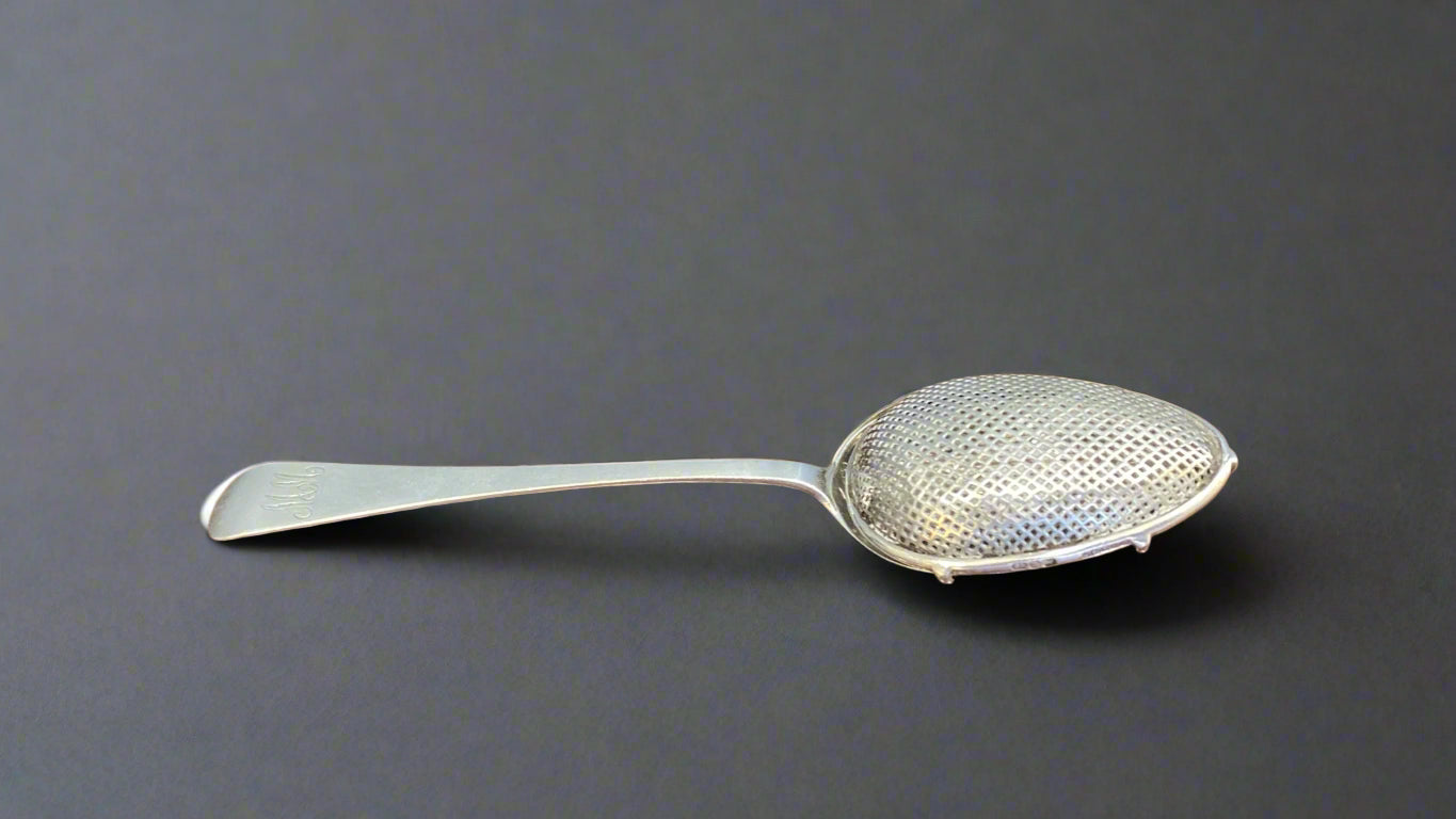 silver tea strainer