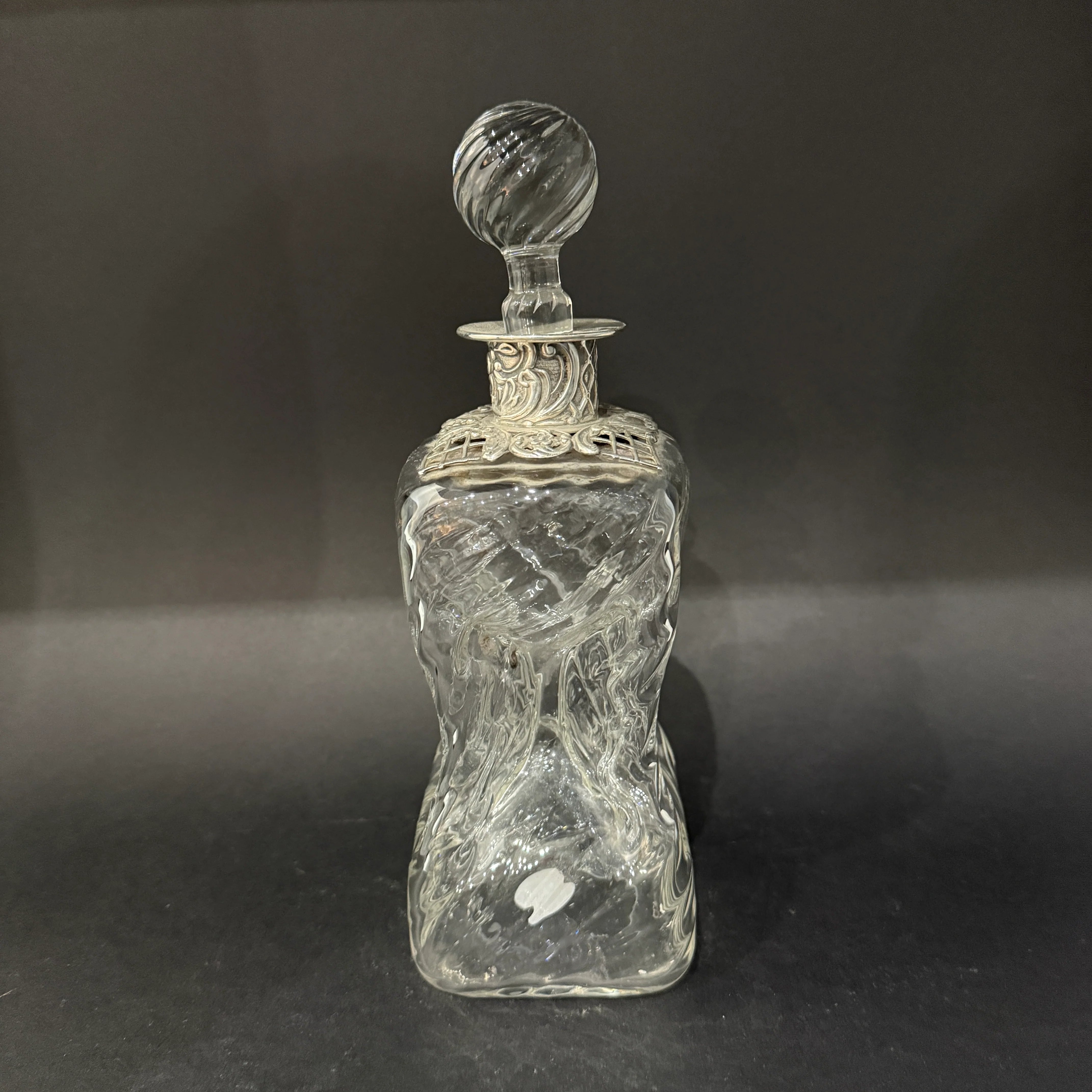 William Comyns silver topped decanter.