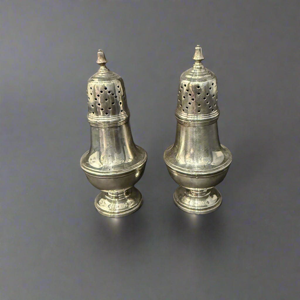 pair of silver salt and pepper shakers