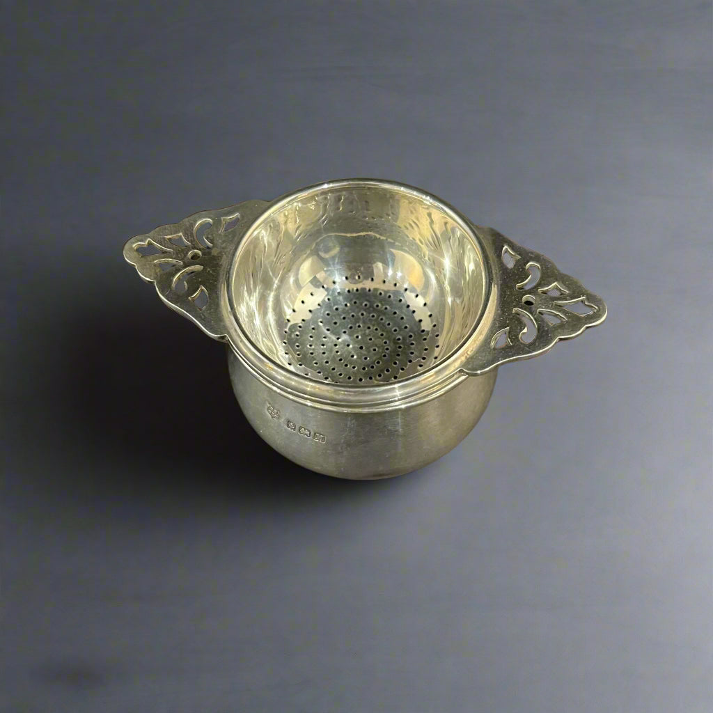 Silver tea strainer and bowl by Barker Bros of Birmingham 1936