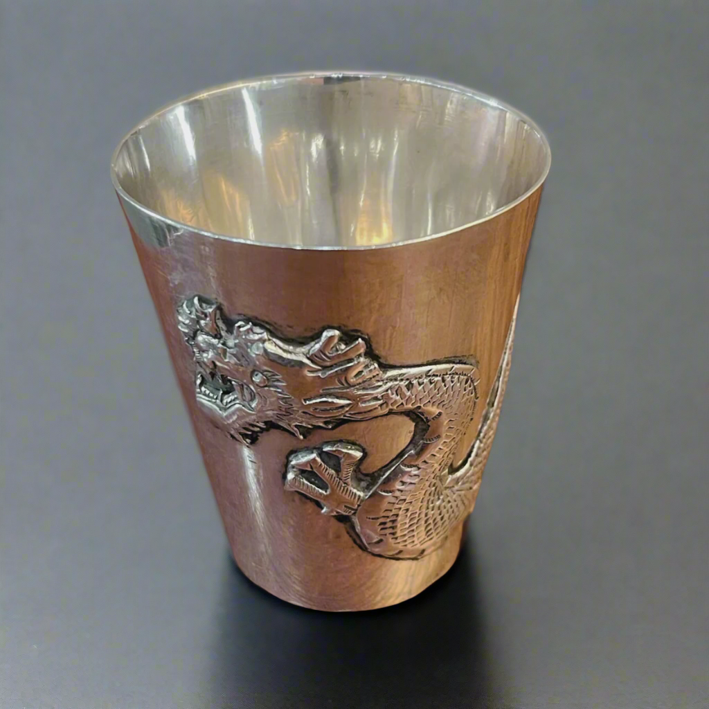 Small Chinese silver spirit measure with decorative dragon