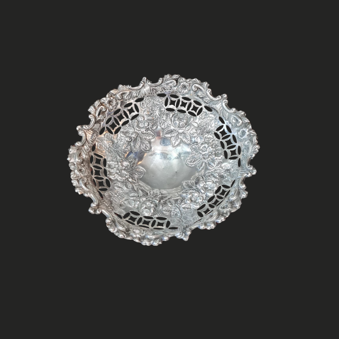 Silver pierced bon bon dish with floral design made in Birmingham 1892 by Nathan & Hayes