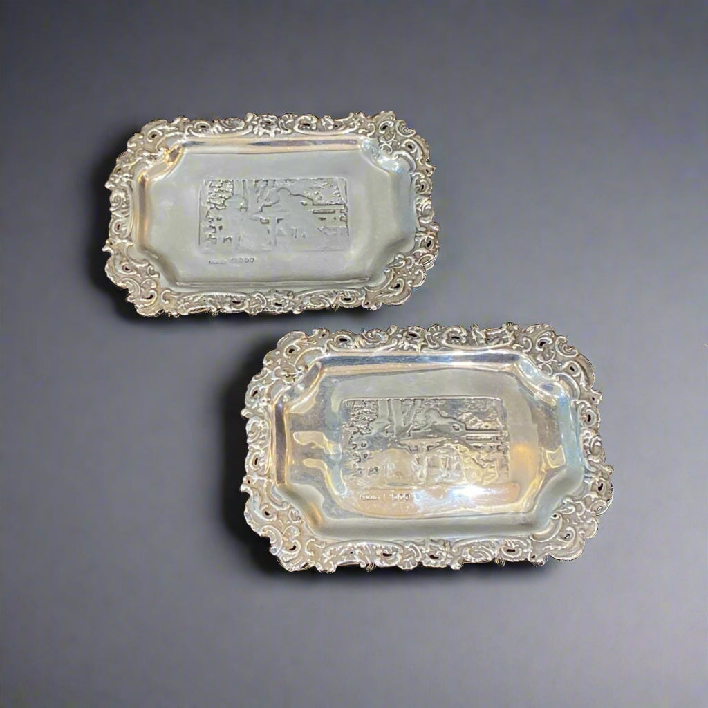 pair of silver key trays