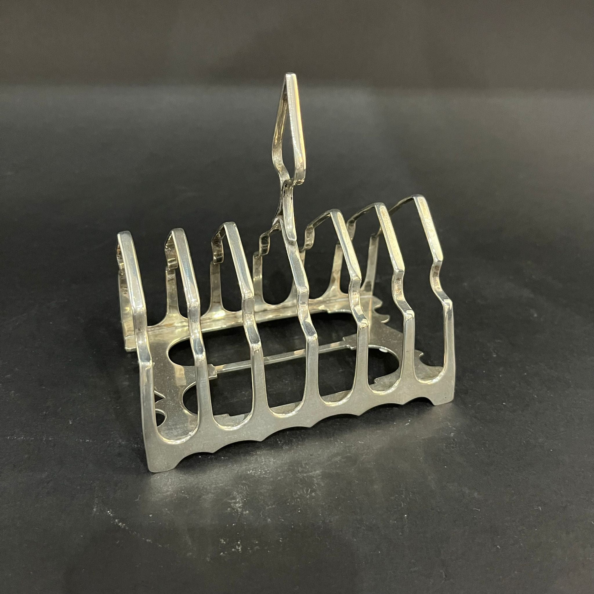 Silver arch 6 bar toast rack made in Sheffield 1909 by James Dixon